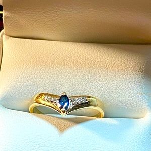 10k gold ring USED. With genuine marqui sapphire